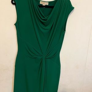 Beautiful green cocktail dress. Worn once and in excellent condition. Size S.